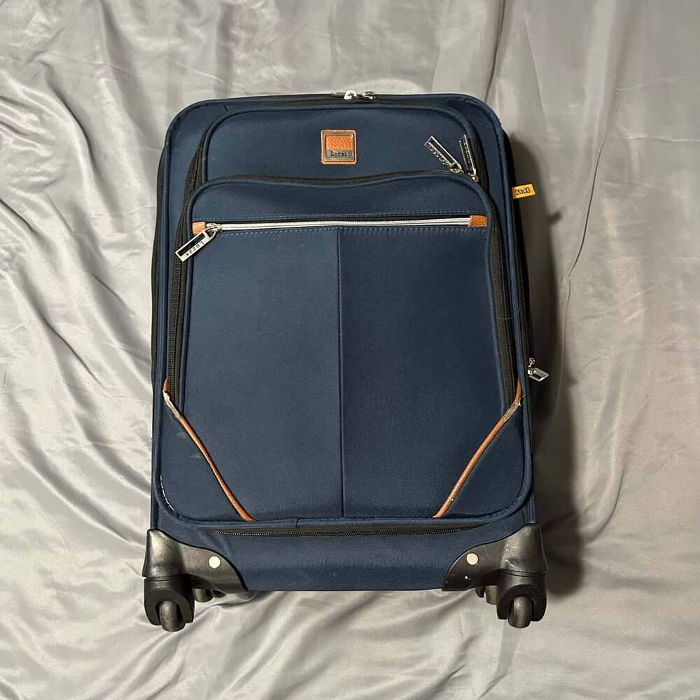 Lucas Designer Spinner Softside Carry-On Suitcase Blue